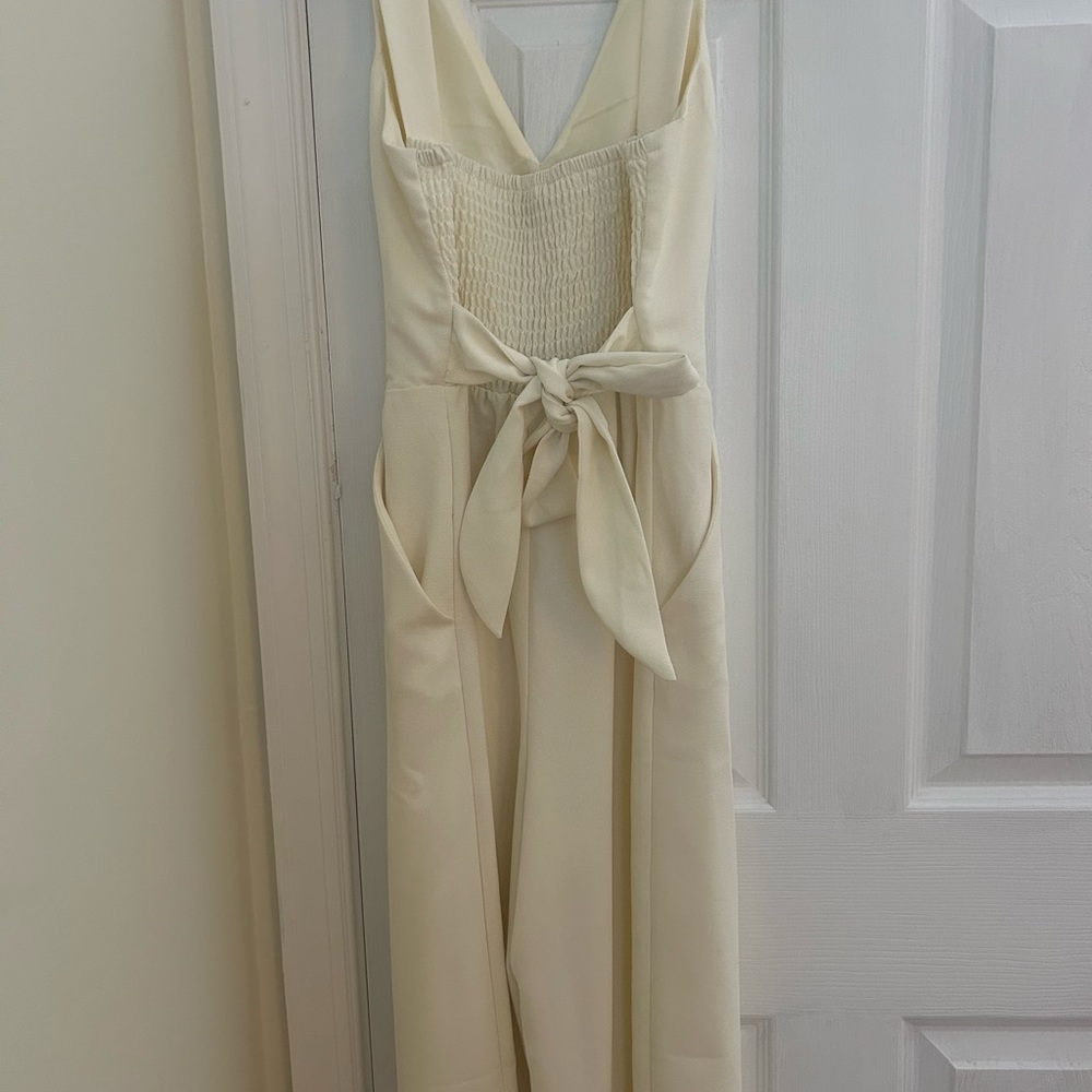 Cream jumpsuit never worn